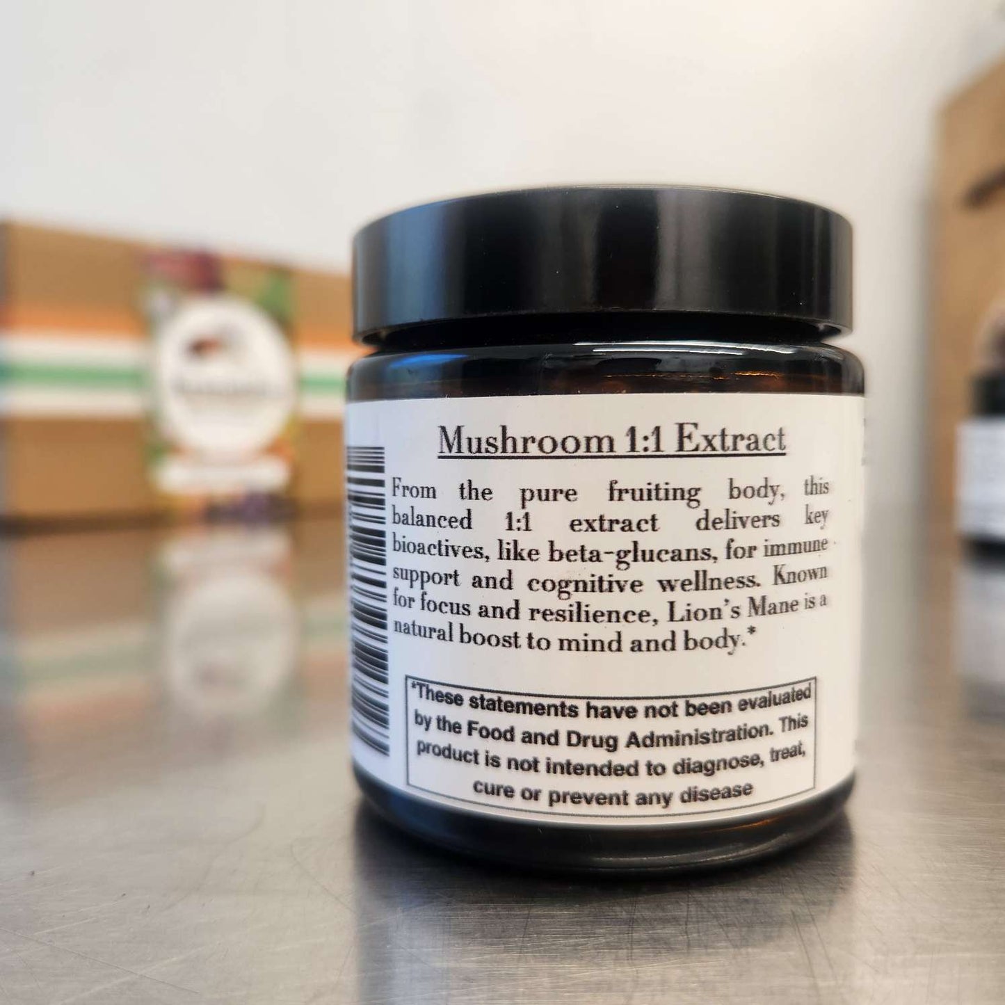 Side view of Armadillo Myco Supply Lion’s Mane Mushroom Extract bottle, displaying the product description and key benefits for cognitive health, mood, and immune support